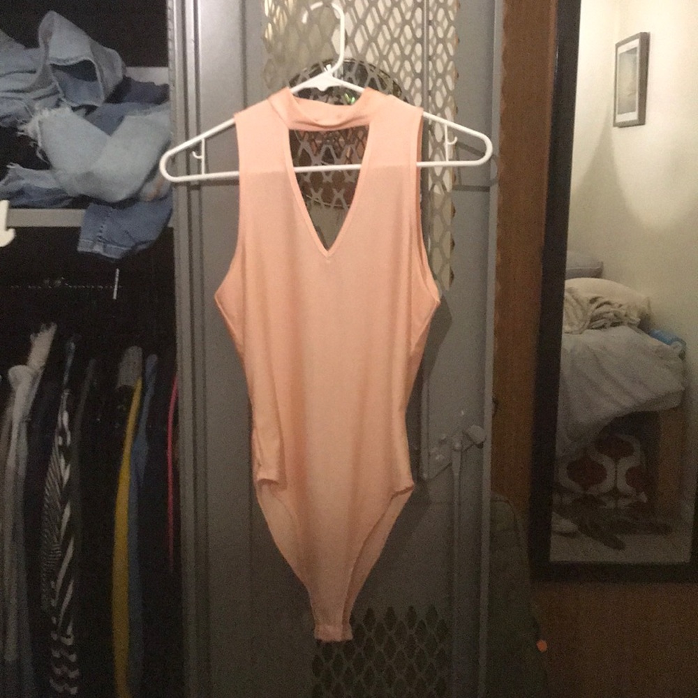 Pink open front body suit